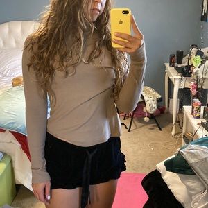 Beige ribbed turtleneck